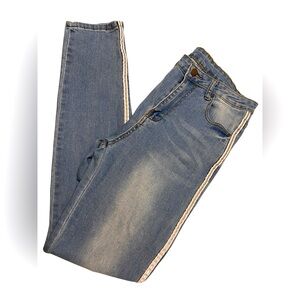 Product:Medium wash blue jean pants with white stripe design on the side